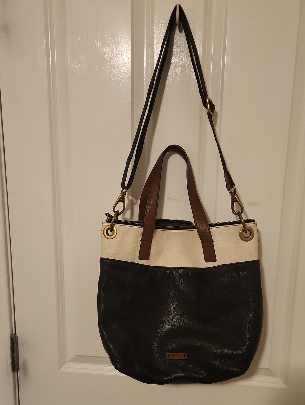 Fossil Leather Two-Tone Tote Bag in Black and Cream with Brown Handles